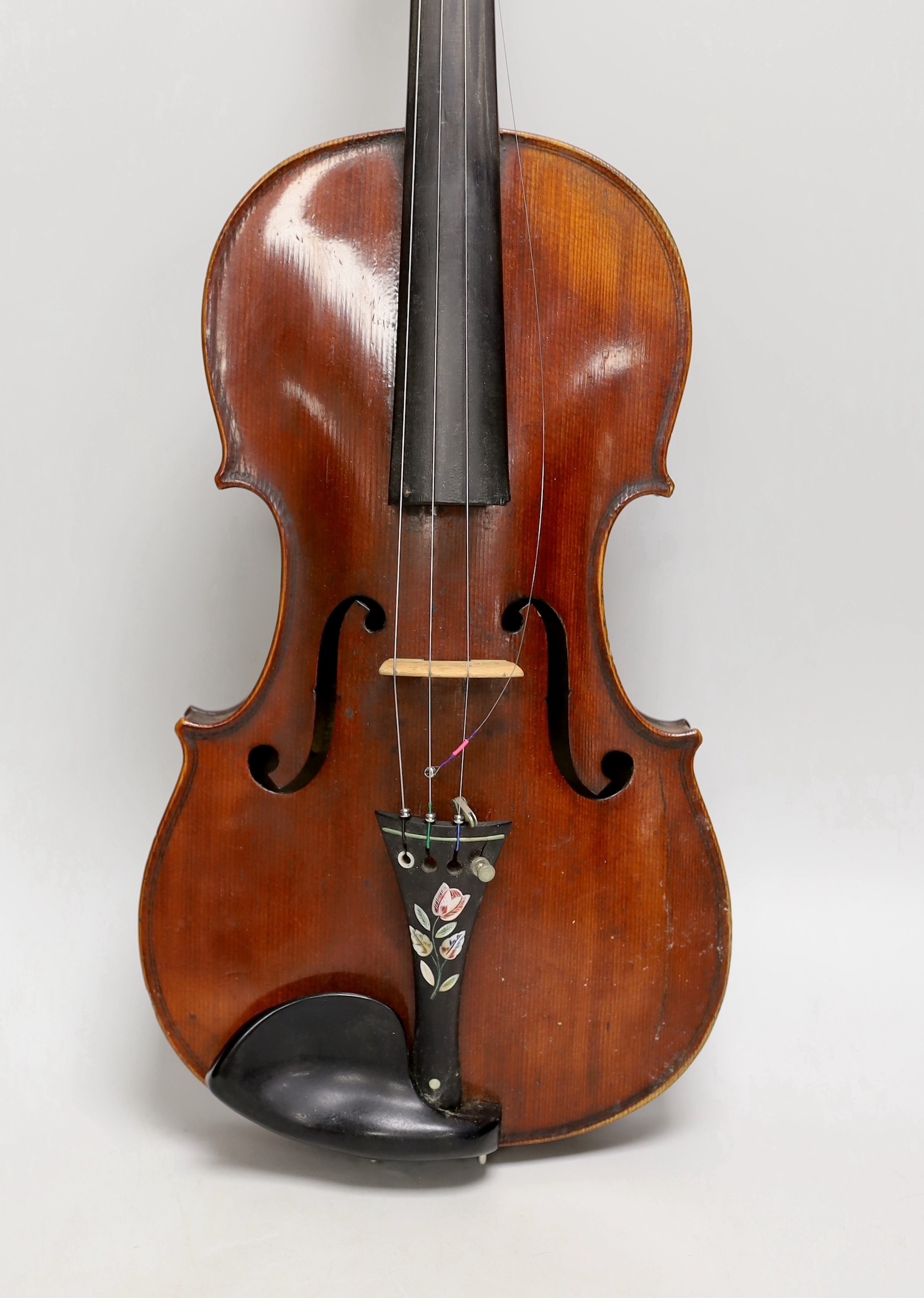 A French single back violin, interior label reads ‘Médio Fino’, back measures 35.5cm excl button. With case and bow